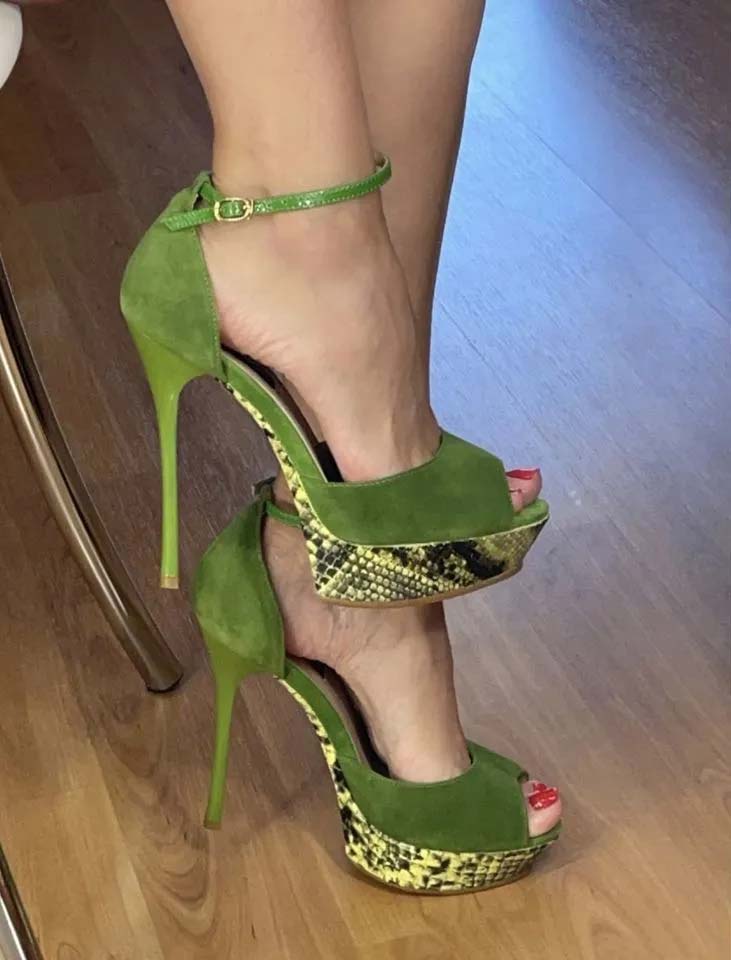 sexy feet on green high heels